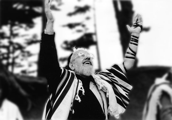 "Reb Zalman in celebratory prayer at Baker’s Beach, California.”