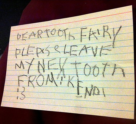 "Note The Tooth Fairy found under the kiddo's pillow: Dear Tooth Fairy please leave my new tooth From: Kendi" Photo by rashida s. mar b., April 13, 2013. Available via Flickr.